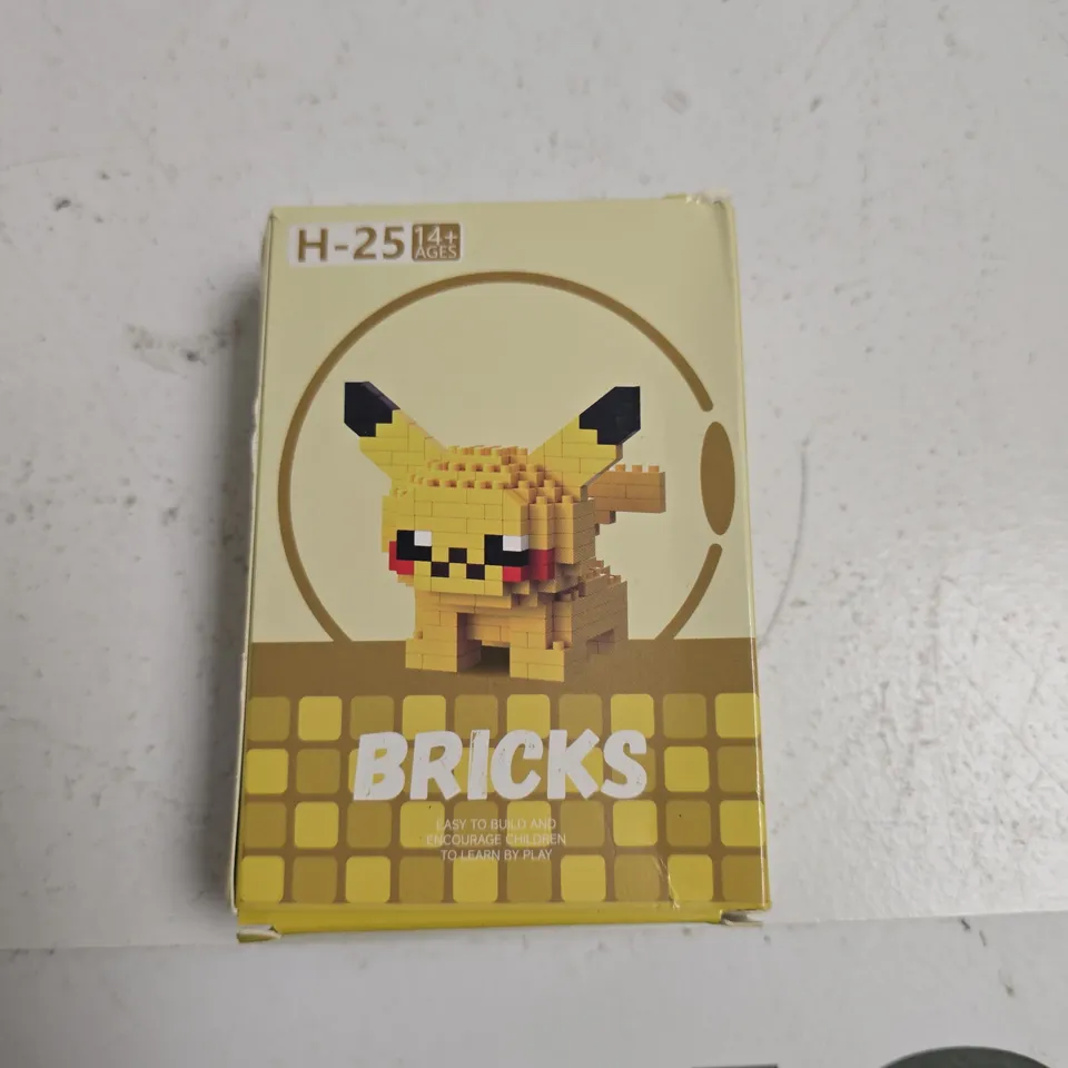 TOTE OF APPROXIMATELY 15 ASSORTED ITEMS INCLUDING POKEMON SOFT TOY, BRICKS AND MICRO BRICKS