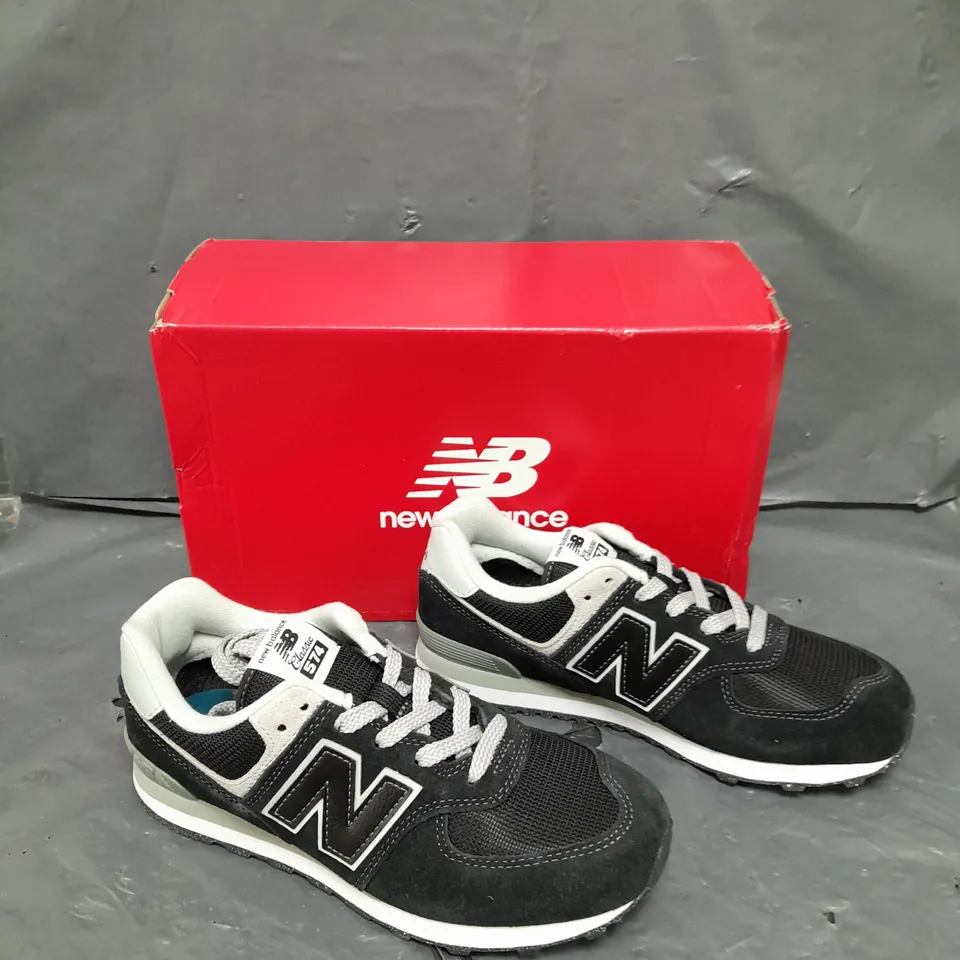 BOXED PAIR OF NEW BALANCE CLASSIC 574 BLACK UK 4 1/2 