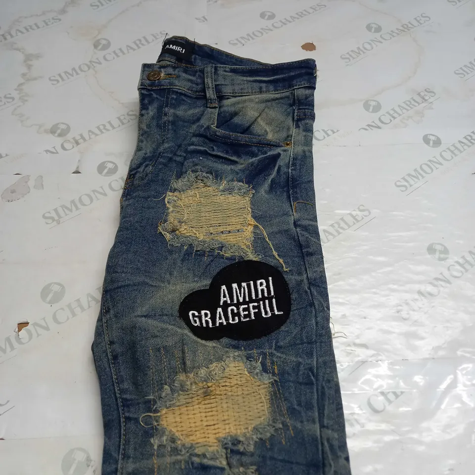 AMIRI SKINNY STRETCH JEANS -  SIZE 31
