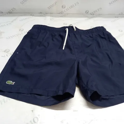 NAVY BLUE LACOSTE SWIM SHORTS SIZE 7