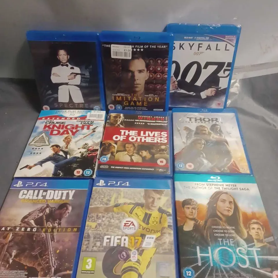 TOTE OF APPROXIMATELY 20 ASSORTED DVD'S & VIDEO GAMES TO INCLUDE -  PS4 FIFA 17 , BLU-RAY SKFALL , PS4 CALL OF DUTY ADVANCED WARFARE ETC