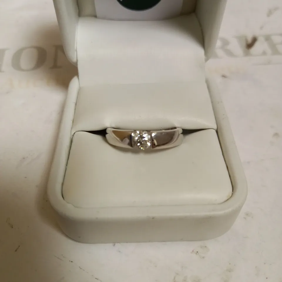 18CT WHITE GOLD SOLITAIRE RING TENSION SET WITH A DIAMOND WEIGHING +0.50ct
