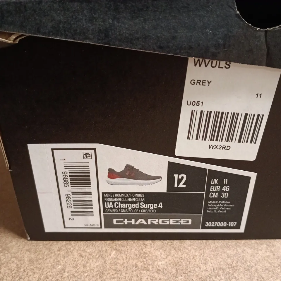 BOXED PAIR OF UNDER ARMOUR UA CHARGED SURGE 4 RUNNING SHOES – GREY/RED, UK 11 (MEN'S)