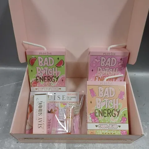 BOX OF 4 ASSORTED PLOUISE PRODUCTS TO INCLUDE - BAD B*TCH ENERGY LIP DUO IN PINK LEMONADE - STAY SHINING HYDRATING LIP FORMULA IN BUBBLE BAE - BAD B*TCH ENERGY LIP DUO IN WATER MY MELON