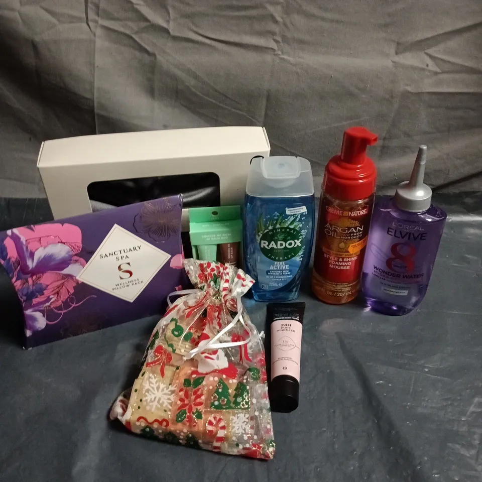 APPROXIMATEY 20 ASSORTED HEALTH AND BEAUTY PRODUCTS TO INCLUDE - RADOX SHOWER GEL - SANCTUARY SPA WELLNESS PILLOW PACK AND L'OREAL ELVIVE WONDER WATER