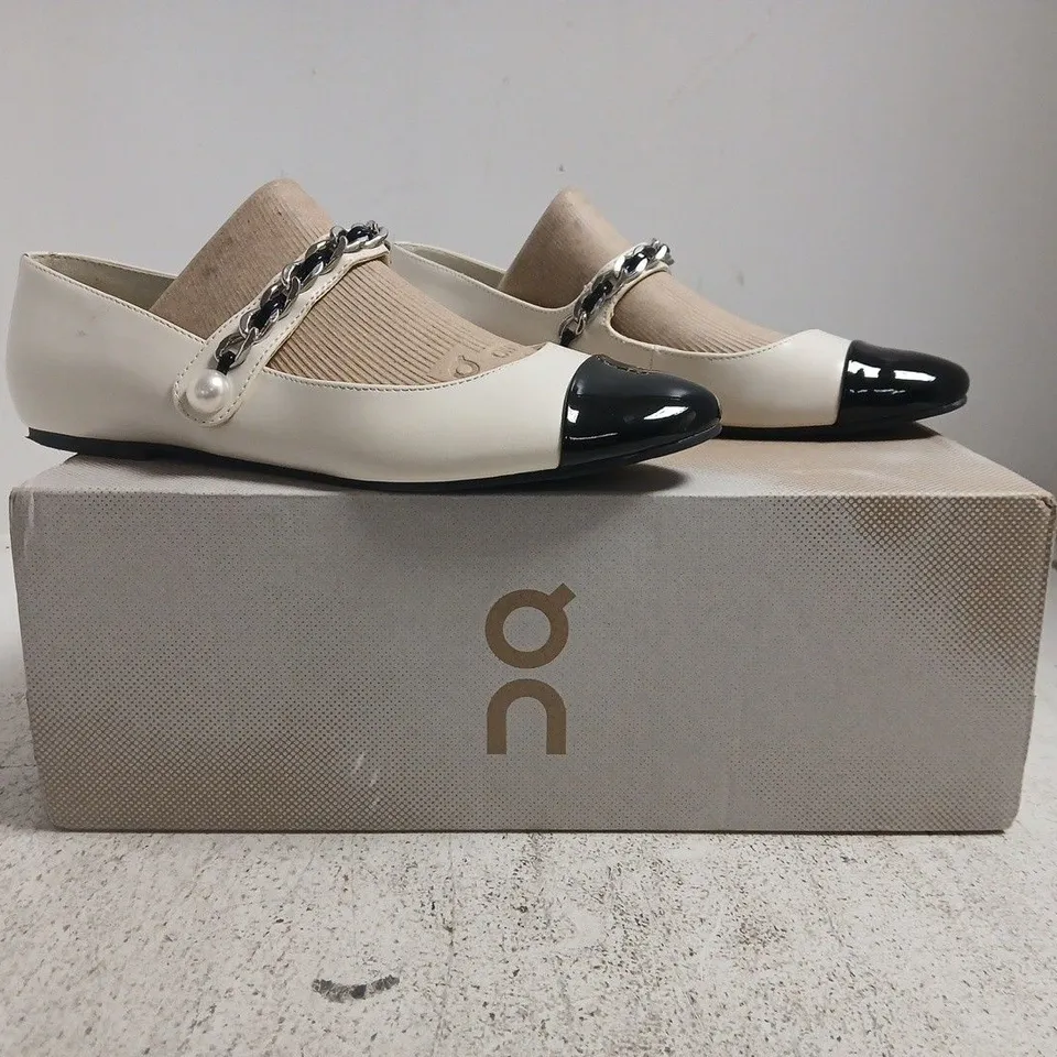 BOXED PAIR OF NINE WEST WOMEN'S LEATHER MARY JANE SHOES IN BEIGE/CREAM WITH BLACK TOE CAP