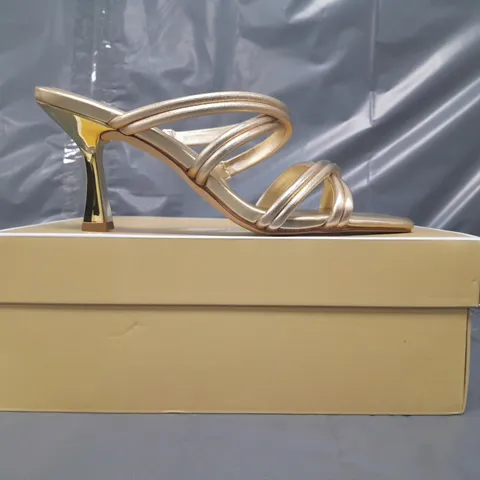 BOXED PAIR OF MICHAEL KORS OPEN TOE STRAPPY HEELED SANDALS IN METALLIC GOLD US SIZE 9