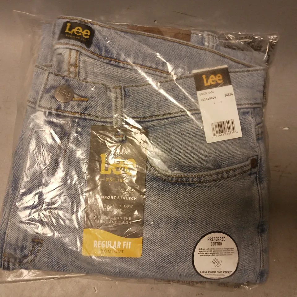 BRAND NEW LEE REGULAR FIT BOOT CUT JEANS IN BLUE SIZE 34/34