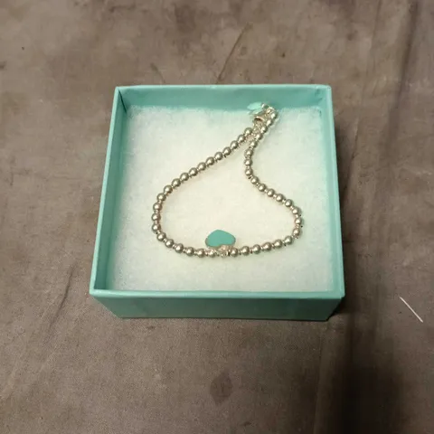 TIFFANY & CO. BEADED BRACELET WITH TURQUOISE HEART CHARM – BOXED