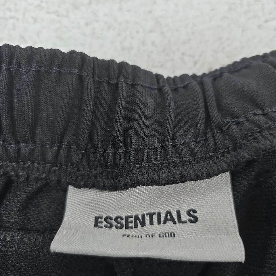 ESSENTIALS BY FEAR OF GOD BLACK DRAWSTRING SHORTS 