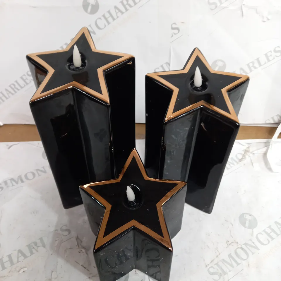 HOME REFLECTIONS CERAMIC STAR PRE-LIT CANDLES