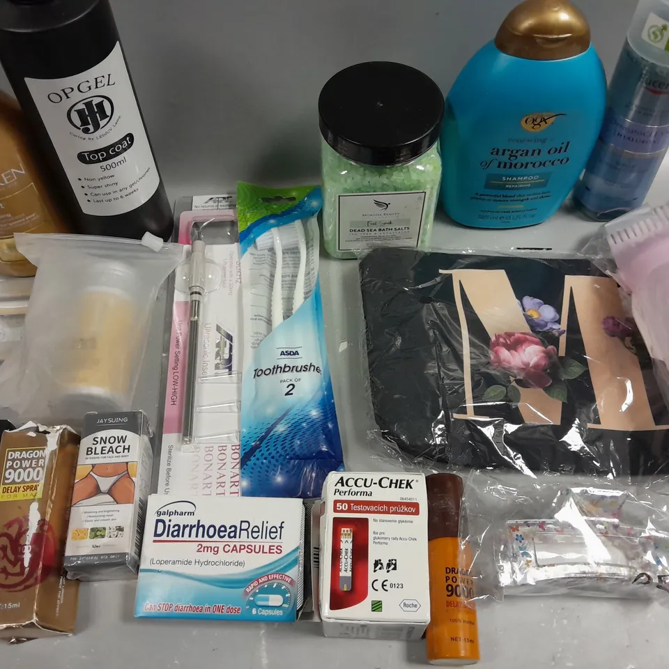 BOX OF APPROXIMATELY 15 COSMETIC ITEMS TO INCLUDE OGX SHAMPOO, OPGEL TOP COAT, REDKEN SHAMPOO , ETC