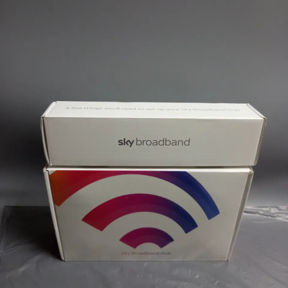 boxed and sealed sky broadband hub and accessories
