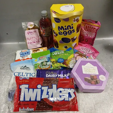 APPROXIMATELY 12 ASSORTED FOOD & DRINK ITEMS TO INCLUDE - MINI EGGS EASTER EGG - STRAWBERRY TWIZZLERS - KINDER MINI EGGS - ETC