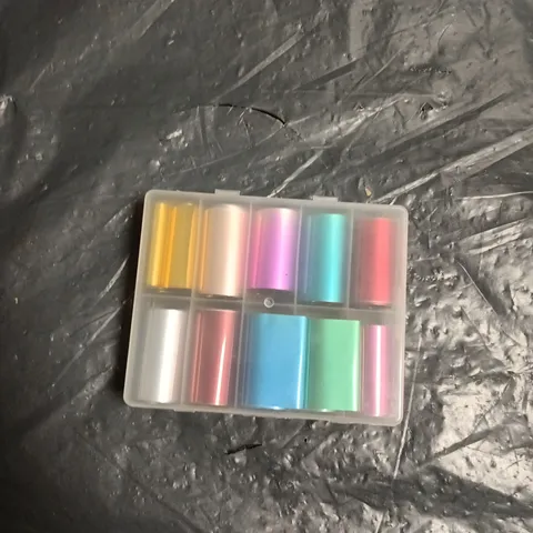 BOX OF APPROXIMATELY 25 ASSORTED NAIL FOIL ART