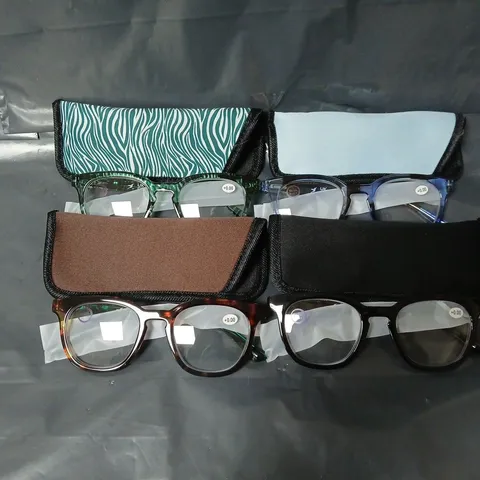 4 PAIRS OF HUMMINGBIRD BLUE BLOCK READER GLASSES TO INCLUDE BLACK, TORT GREEN, BLUE STRIPE, GREEN ZEBRA STRIPE
