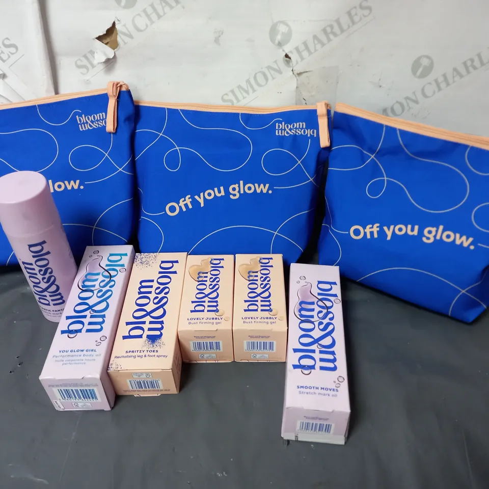 LOT OF APPROXIMATELY 9 BLOOM AND BLOSSOM SKIN CARE PRODUCTS WITH BAGS