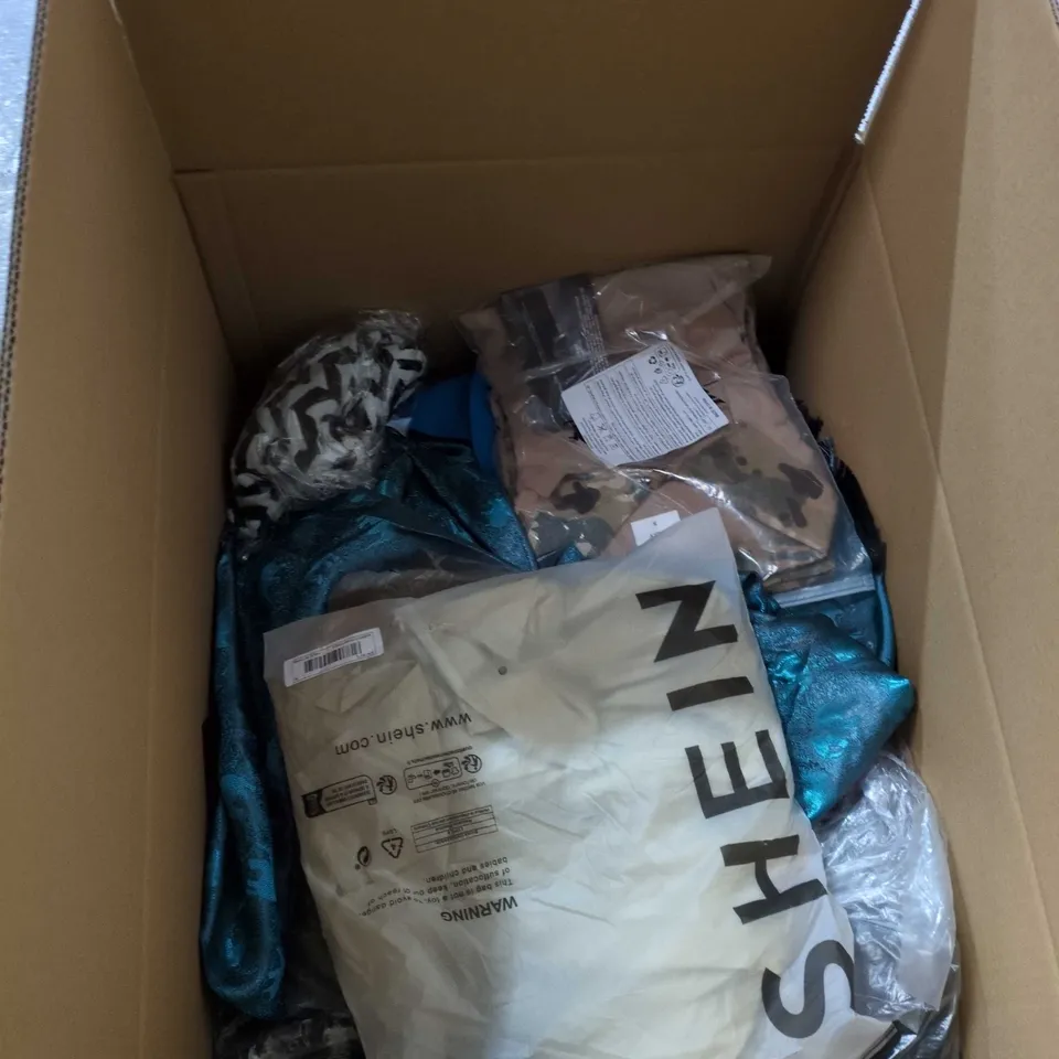 BOX OF APPROXIMATELY 25 ASSORTED CLOTHING ITEMS INCLUDING GRAPHIC DESIGN T SHIRT , CAMOUFLAGE TROUSERS AND BLACK LIGHTWEIGHT TROUSERS