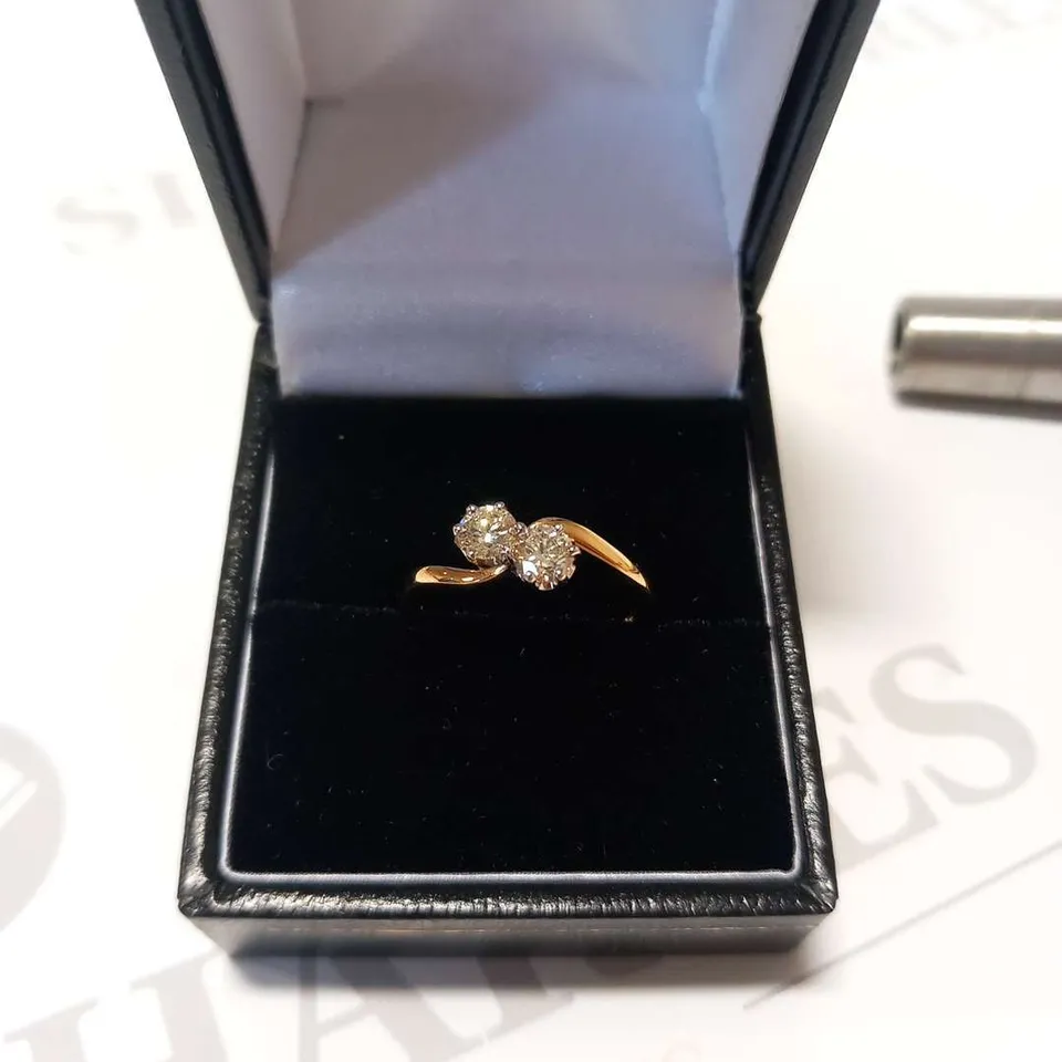 18CT GOLD TWIST RING SET WITH NATURAL DIAMONDS