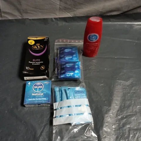 APPROXIMATELY 20 PACKS OF ASSORTED CONDOMS AND LUBE SACHETS TO INCLUDE SKYN, FUN TIME AND PASANTE