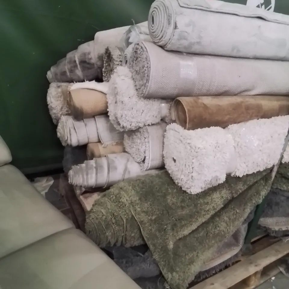 STILLAGE OF APPROXIMATELY 20 QUALITY DESIGNER RUGS