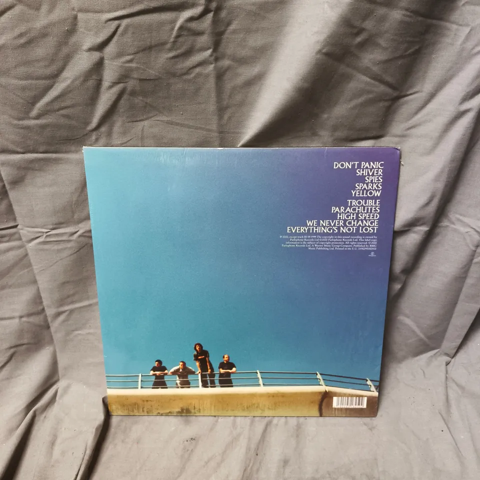 COLDPLAY – PARACHUTES 20TH ANNIVERSARY REISSUE ON TRANSLUCENT YELLOW VINYL (SEALED)