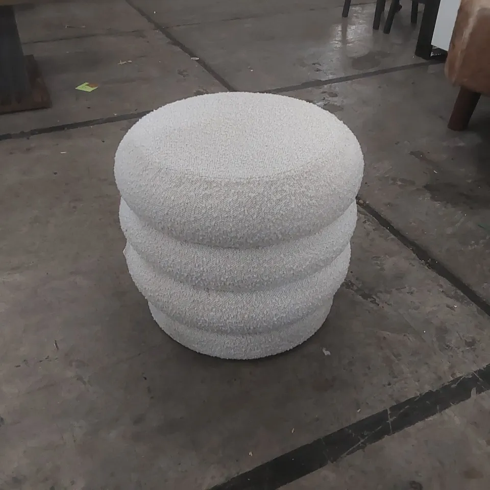 DESIGNER UPHOLSTERED POUFFE