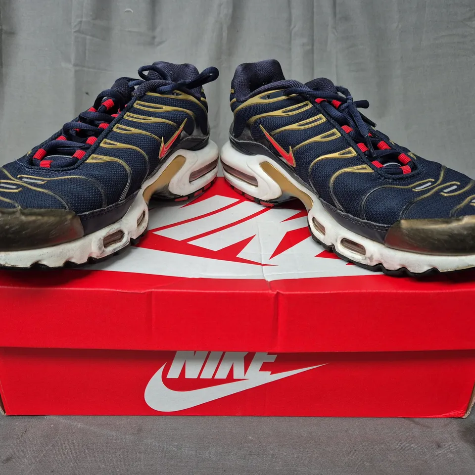 BOXED PAIR OF NIKE AIR TN SHOES IN NAVY/GOLD/RED UK SIZE 9.5