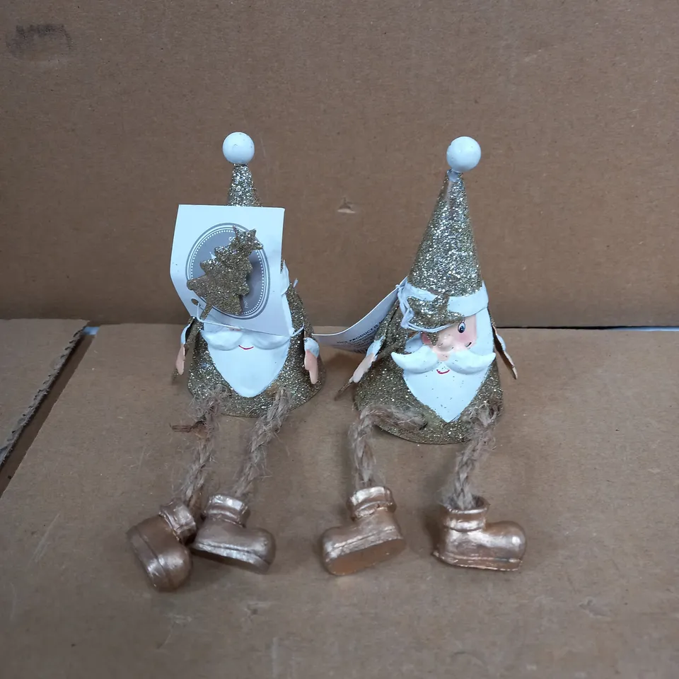 METAL SITTING SANTAS WITH DANGLY LEGS RRP £18