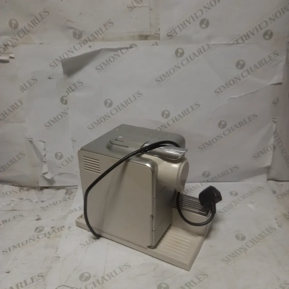 DELONGHI NESPRESSO MACHINE 