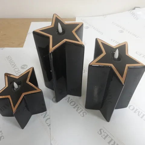HOME REFLECTIONS PORCELAIN STAR PRE-LIT CANDLES SET OF 3 - BLACK