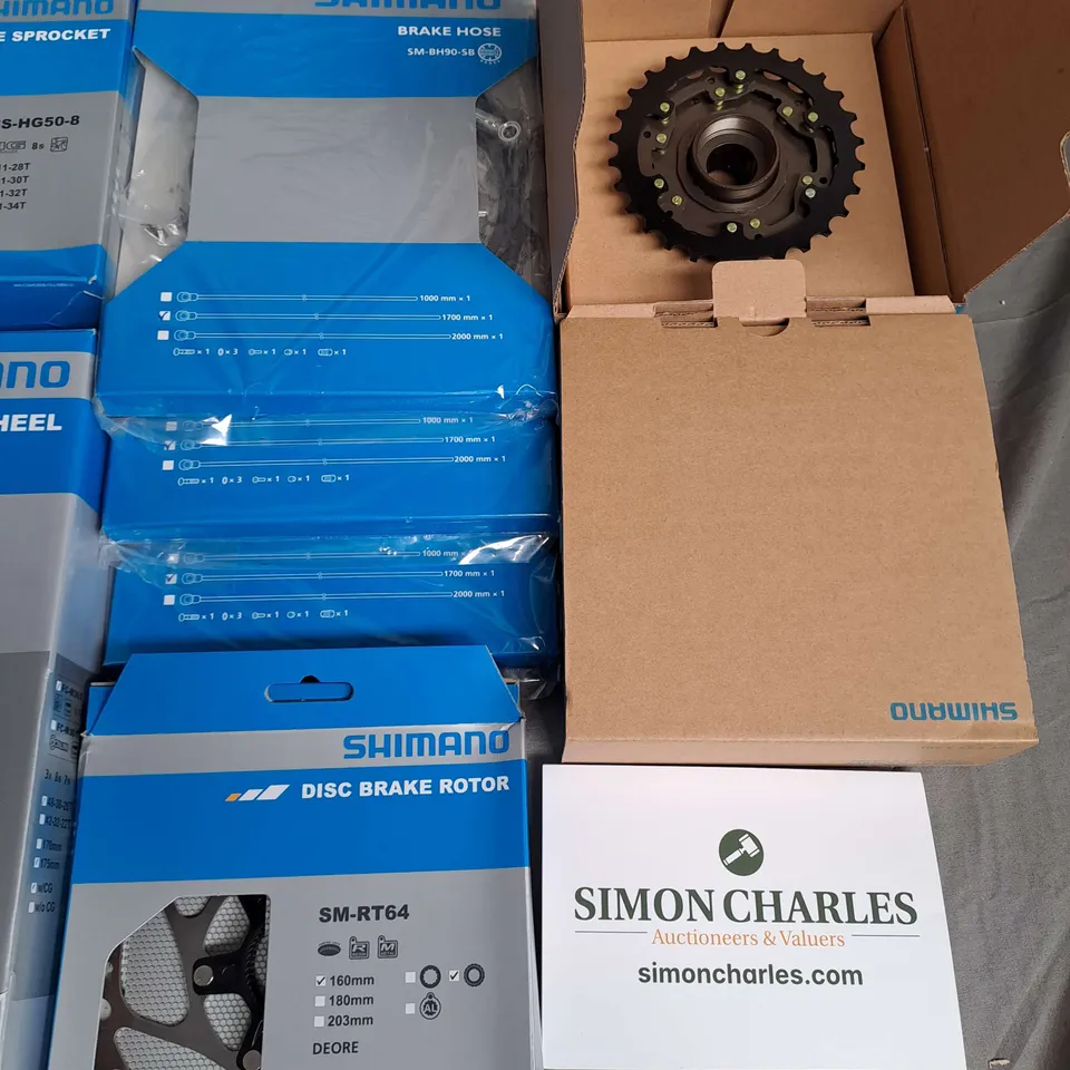 LOT OF 13 ASSORTED SHIMANO CYCLING PARTS TO INCLUDE CASSETTE SPROCKET, SINGLE FREEWHEEL AND FRONT CHAINWHEEL