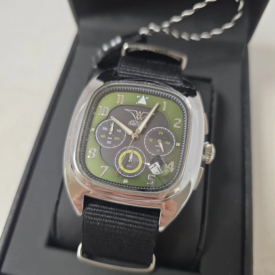 BOXED VICKER ARMSTRONG GYRO STEEL BLACK WATCH WITH GREEN DIAL