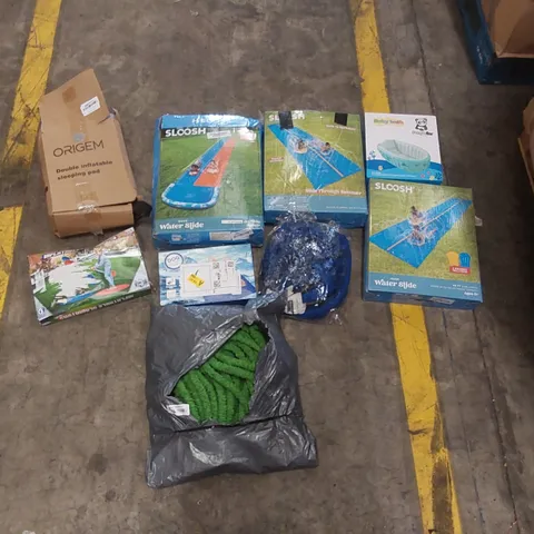 PALLET CONTAINING A LARGE QUANTITY OF ASSORTED HOSE PIPES, POOL INFLATABLES ECT