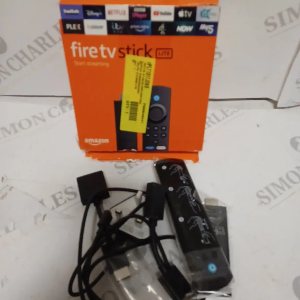 BOXED AMAZON FIRE TV STICK LITE
