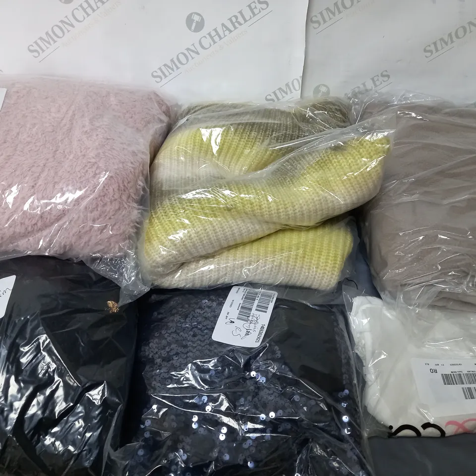 BOX OF ASSORTED CLOTHING ITEMS TOO INCLUDE TOPS , JUMPERS, AND PANTS ETC. 