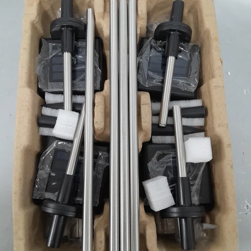 BOXED BELL & HOWELL GLIMMER STICKS SET OF 4 SOLAR PATHWAY LIGHTS