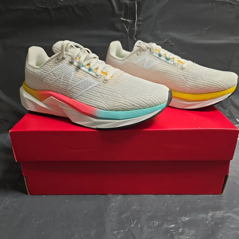 BOXED PAIR OF NEW BALANCE FUELCELL TRAINERS IN WHITE/MULTI SIZE UK 7.5