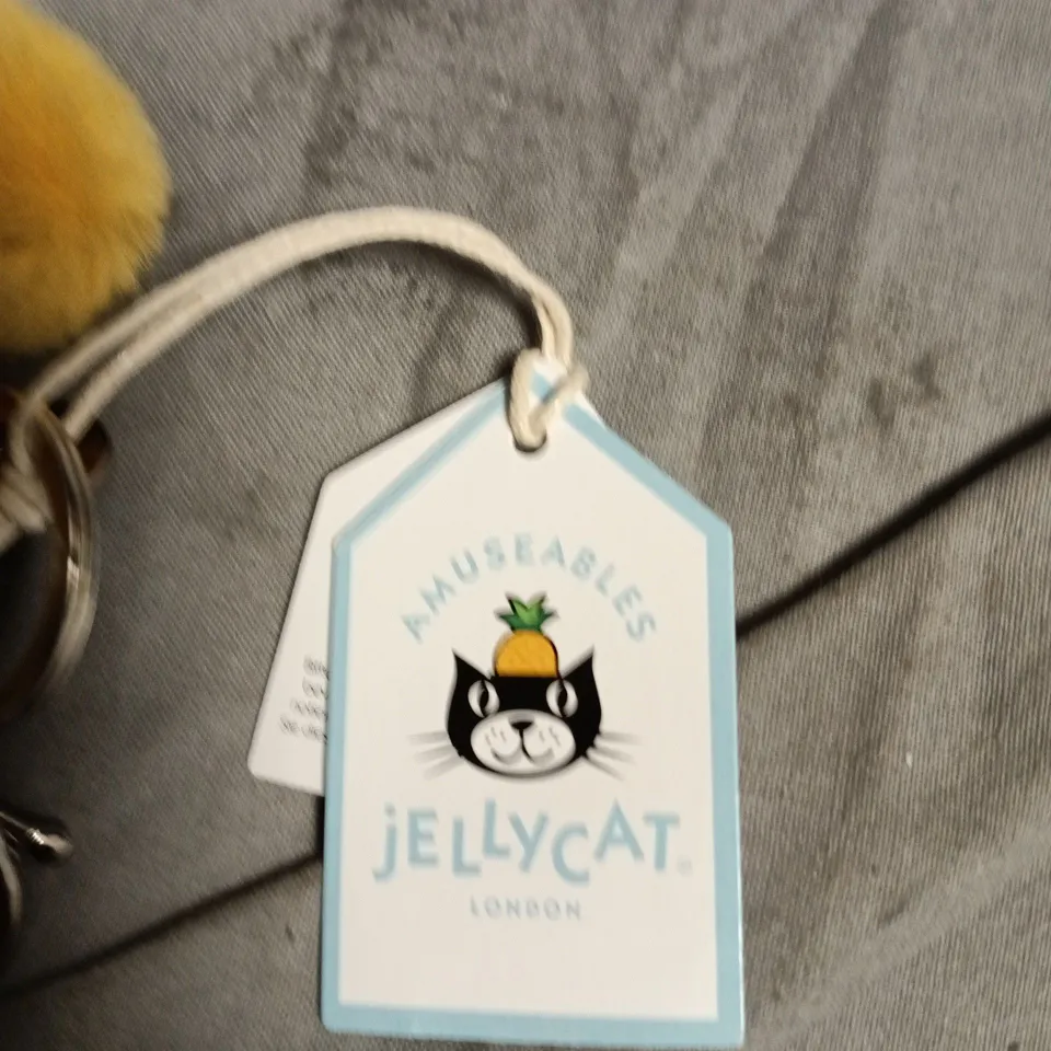JELLYCAT AMUSEABLE SUN BAG CHARM, JELLYCAT LONDON – YELLOW SUN WITH BROWN FEET