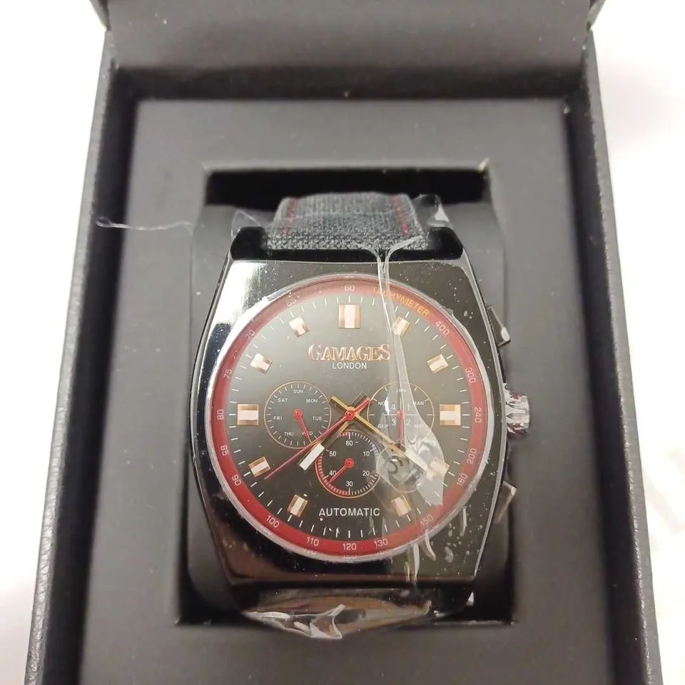 GAMAGES RETRO CALIBRE BLACK TRIPLE DATE DIAL AUTOMATIC TACHYMETER LEATHER STRAP WRISTWATCH	