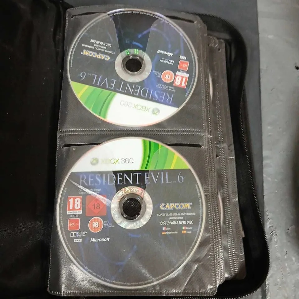 CD/GAME WALLET WITH APPROXIMATELY 50 ASSORTED XBOX 360 GAMES