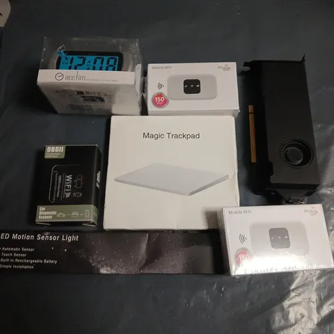 LOT OF 16 ASSORTED HOUSEHOLD ITEMS TO INCLUDE MAGIC TRACKPAD, ALARM CLOCK AND LED MOTION SENSOR LIGHTS