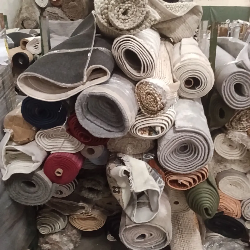 STILLAGE OF ASSORTED QUALITY RUGS APPROXIMATELY 27
