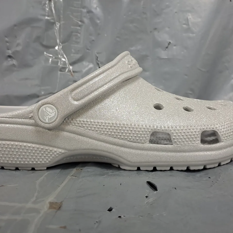 PAIR OF CROCS CLASSIC GLITTER CLOGS IN SILVER SIZE UK M8/W9
