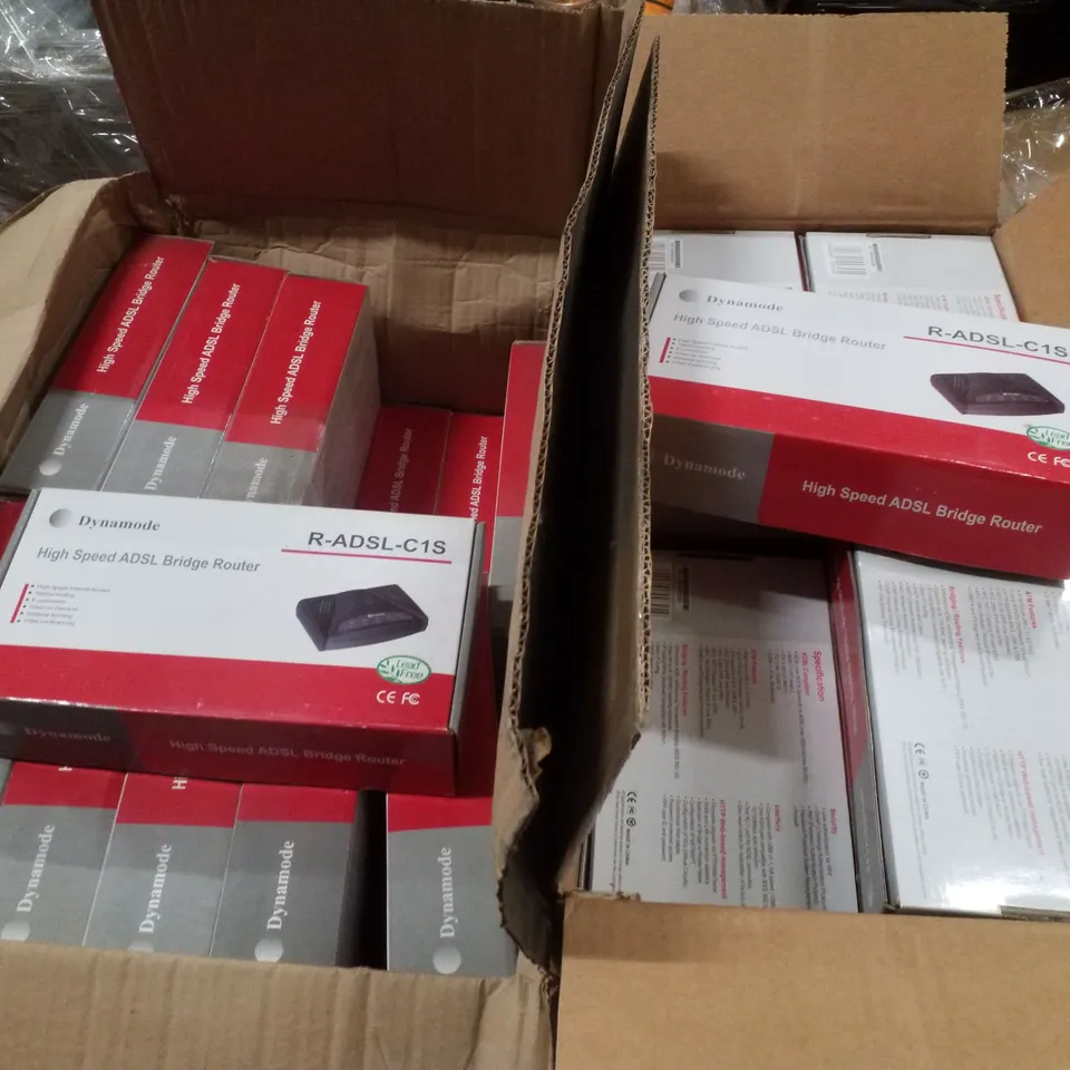PALLET CONTAINING LARGE QUANTITY OF DYNAMODE HIGH SPEED ADSL BRIDGE ROUTERS