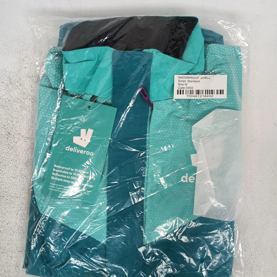 BAGGED DELIVEROO WATERPROOF SHELL JACKET IN TEAL SIZE MEDIUM