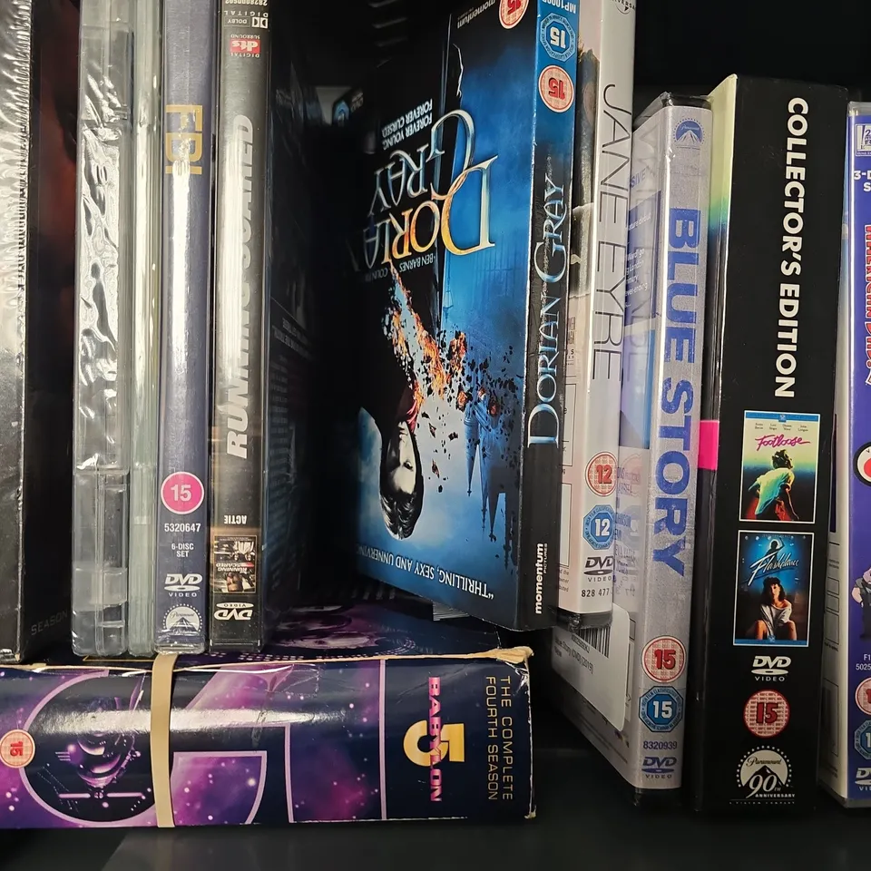 TOTE OF APPROXIMATELY 14 ASSORTED DVD'S TO INCLUDE - THE SECRETS PF ISIS , THE HANGOVER , THE BATMAN ETC