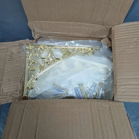 BOX OF APPROXIMATELY 8 ANTIQUE STYLE CORNER BRACKETS IN GOLD