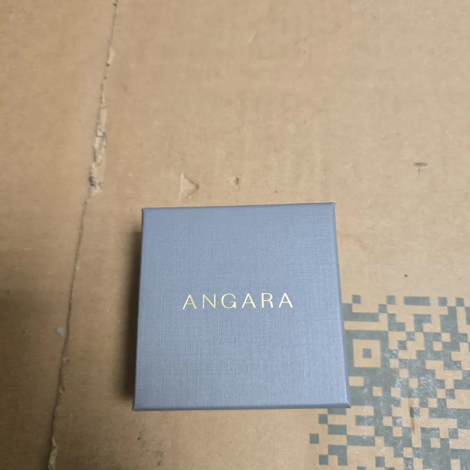 ANGARA BLUE GEMSTONE PENDANT ON RED CORD – BOXED