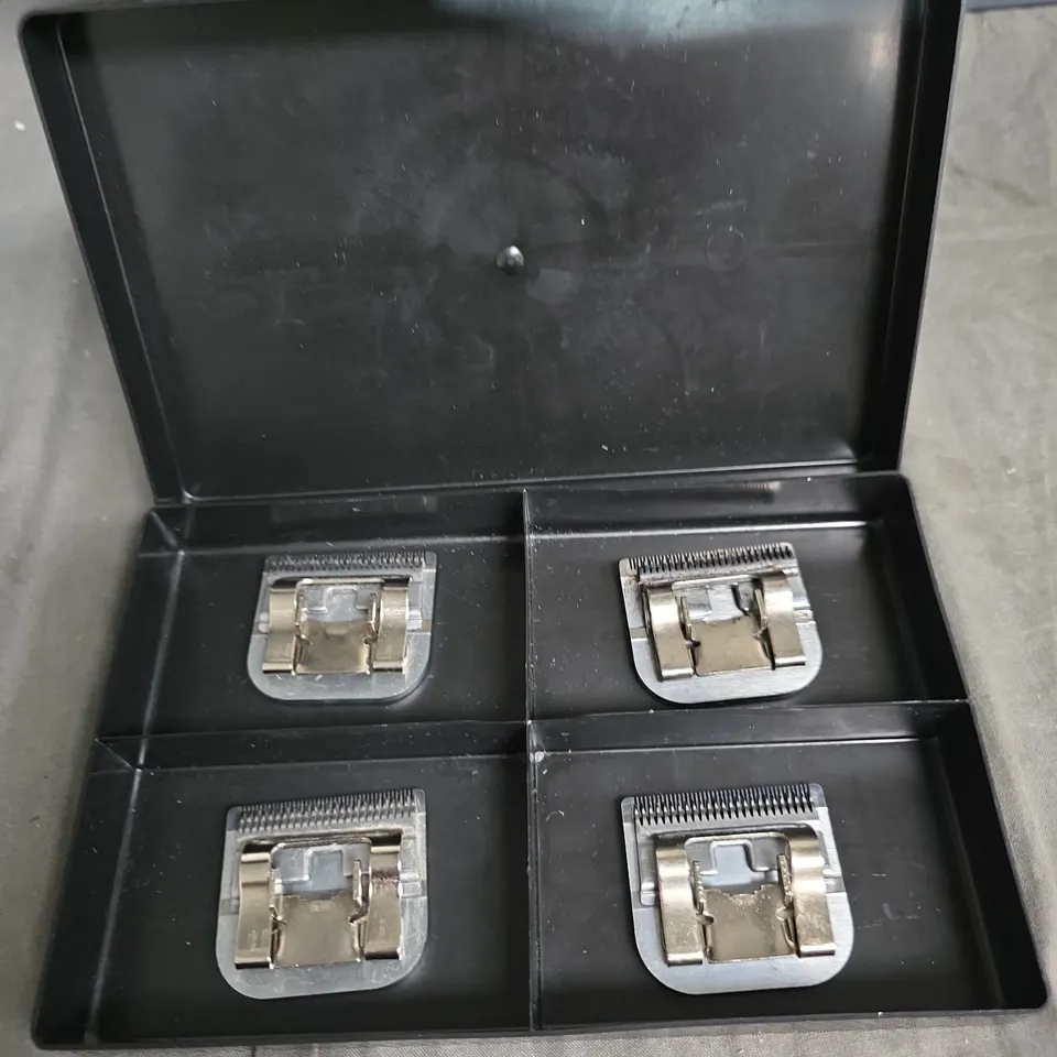 A SET OF SHEAR EASE , PURFECT CLIPPER BLADES IN SIZES 40# 0.25MM.